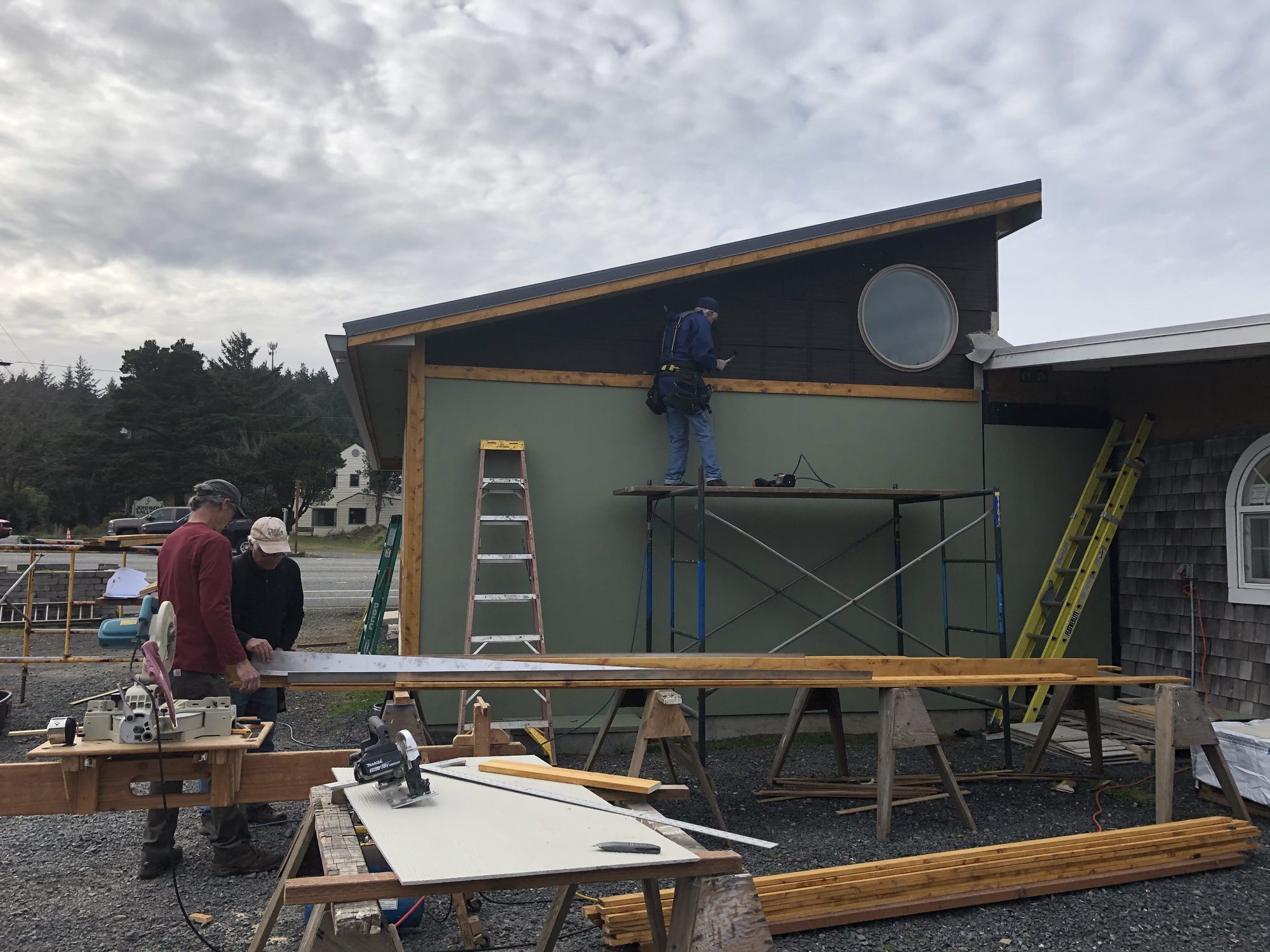 Volunteers on the new addition during the 2020 build